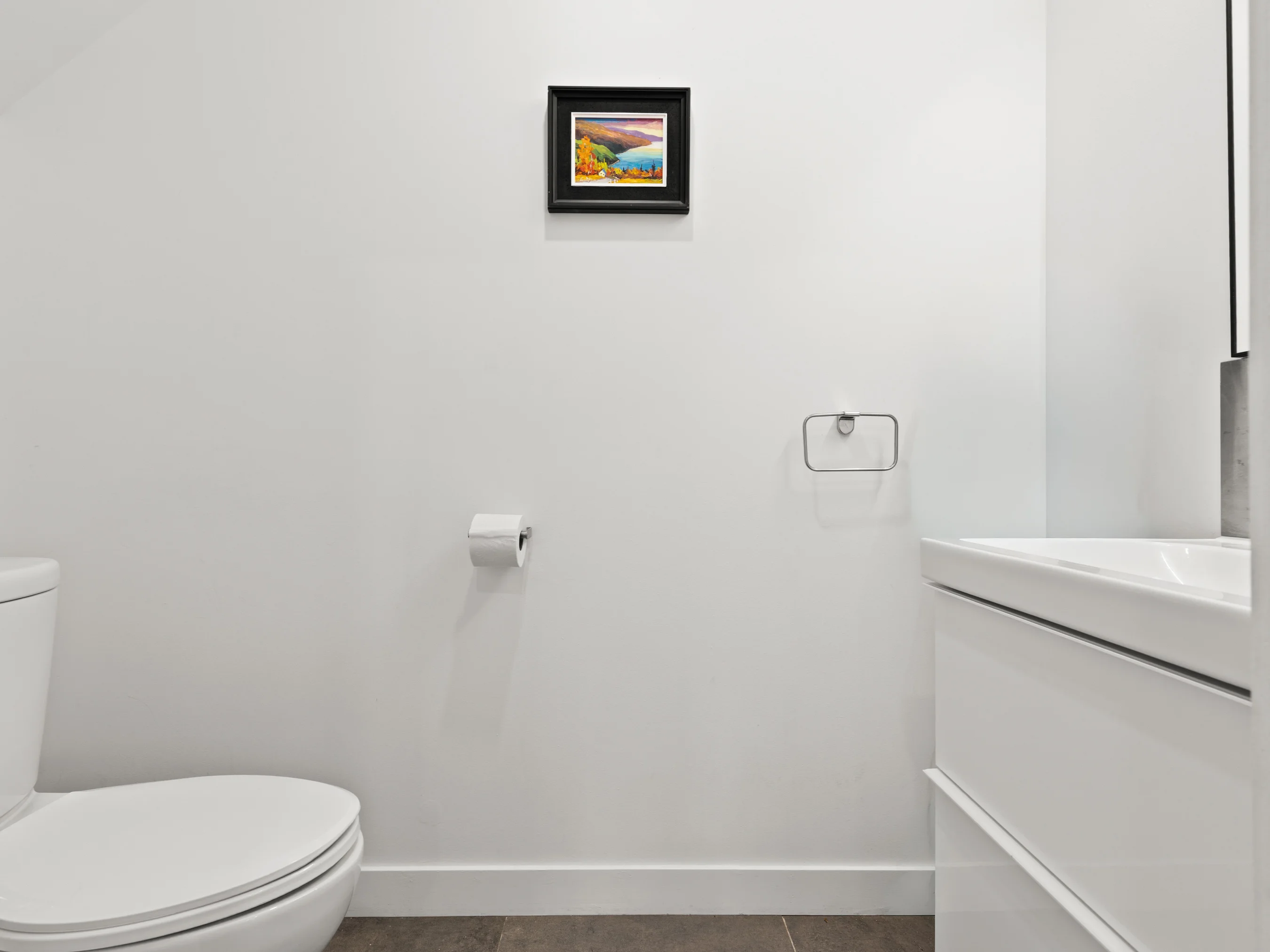 Powder room with sink and toilet at Le Céleste chalet