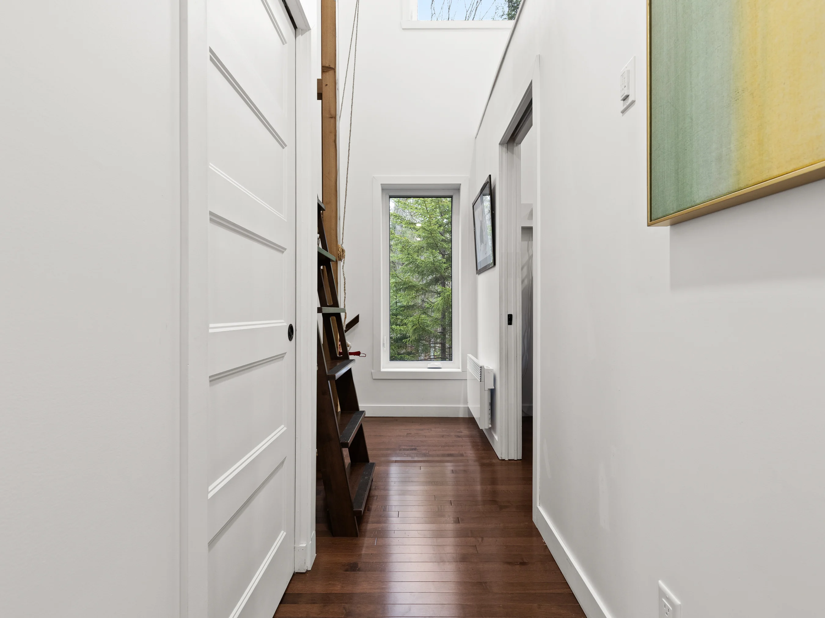 Hallway with mezzanine access at Le Céleste chalet